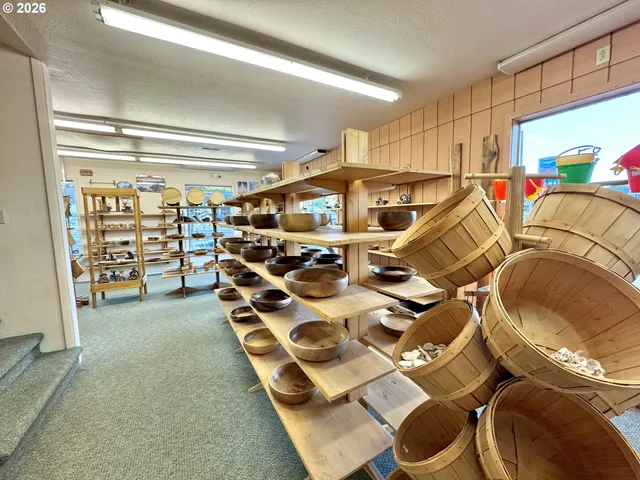 a living room with lots of furniture and a rug