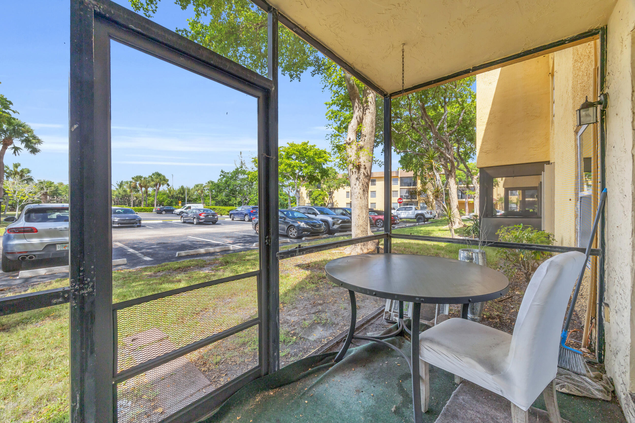 470 Northwest 20th Street, Unit 1050 Boca Raton, FL 33431 - Photo 22 of 28 a view of a dining room with furniture window and outside view