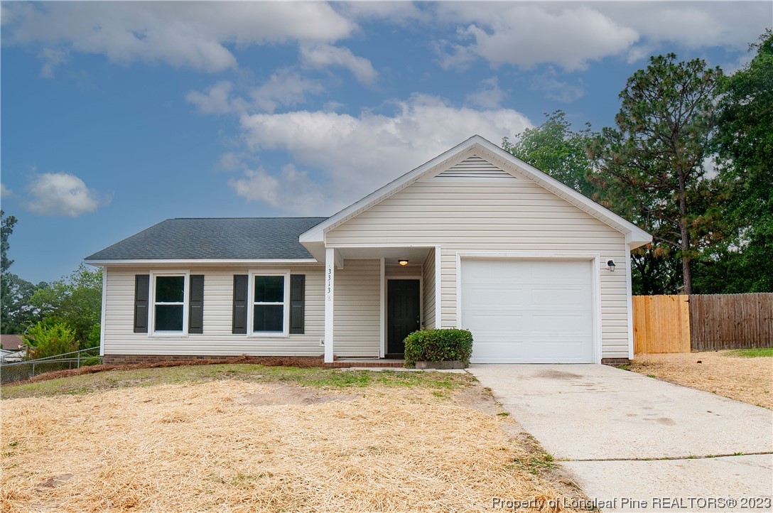 3313 Red Fox Road Spring Lake, NC 28390 - Photo 1 of 33 a view of a house with a yard