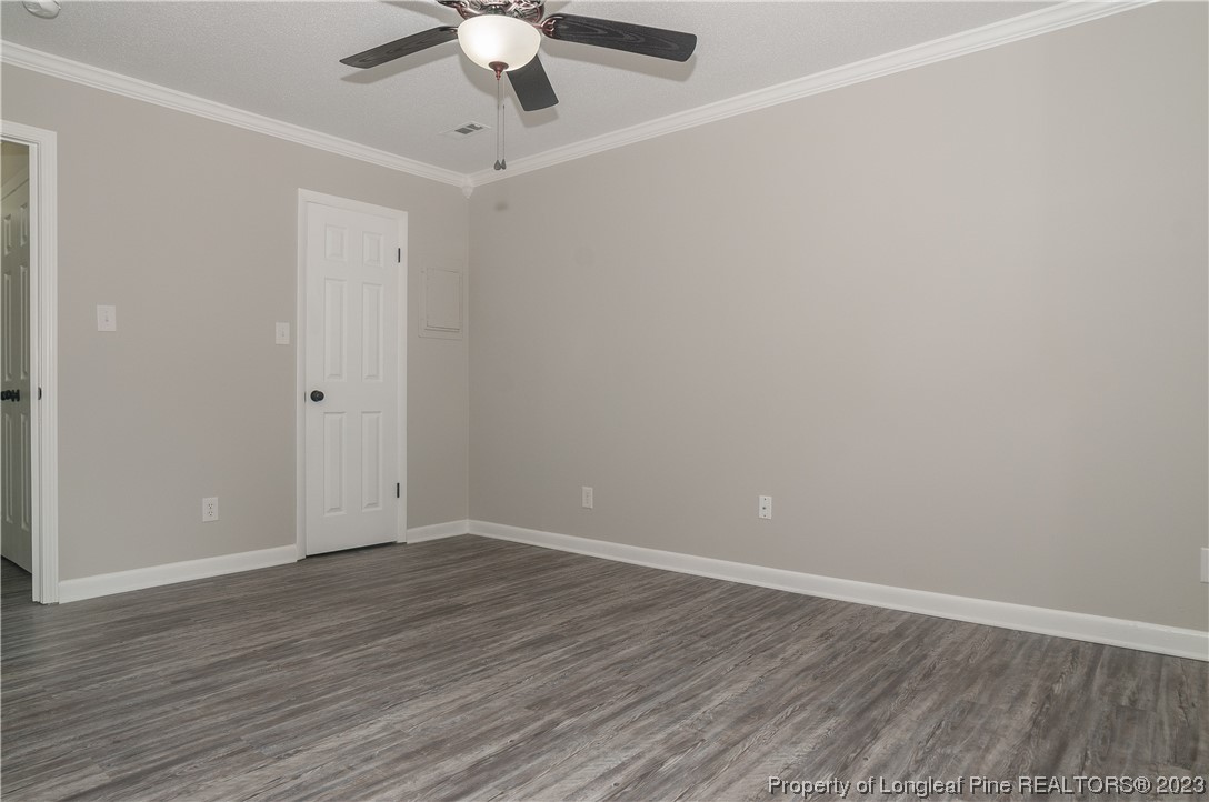 3313 Red Fox Road Spring Lake, NC 28390 - Photo 24 of 33 a view of an empty room with wooden floor
