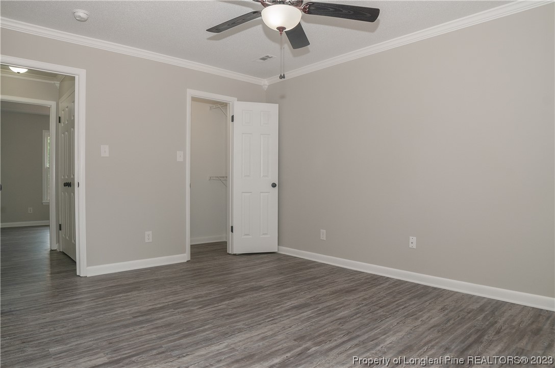 3313 Red Fox Road Spring Lake, NC 28390 - Photo 28 of 33 a view of an empty room with wooden floor