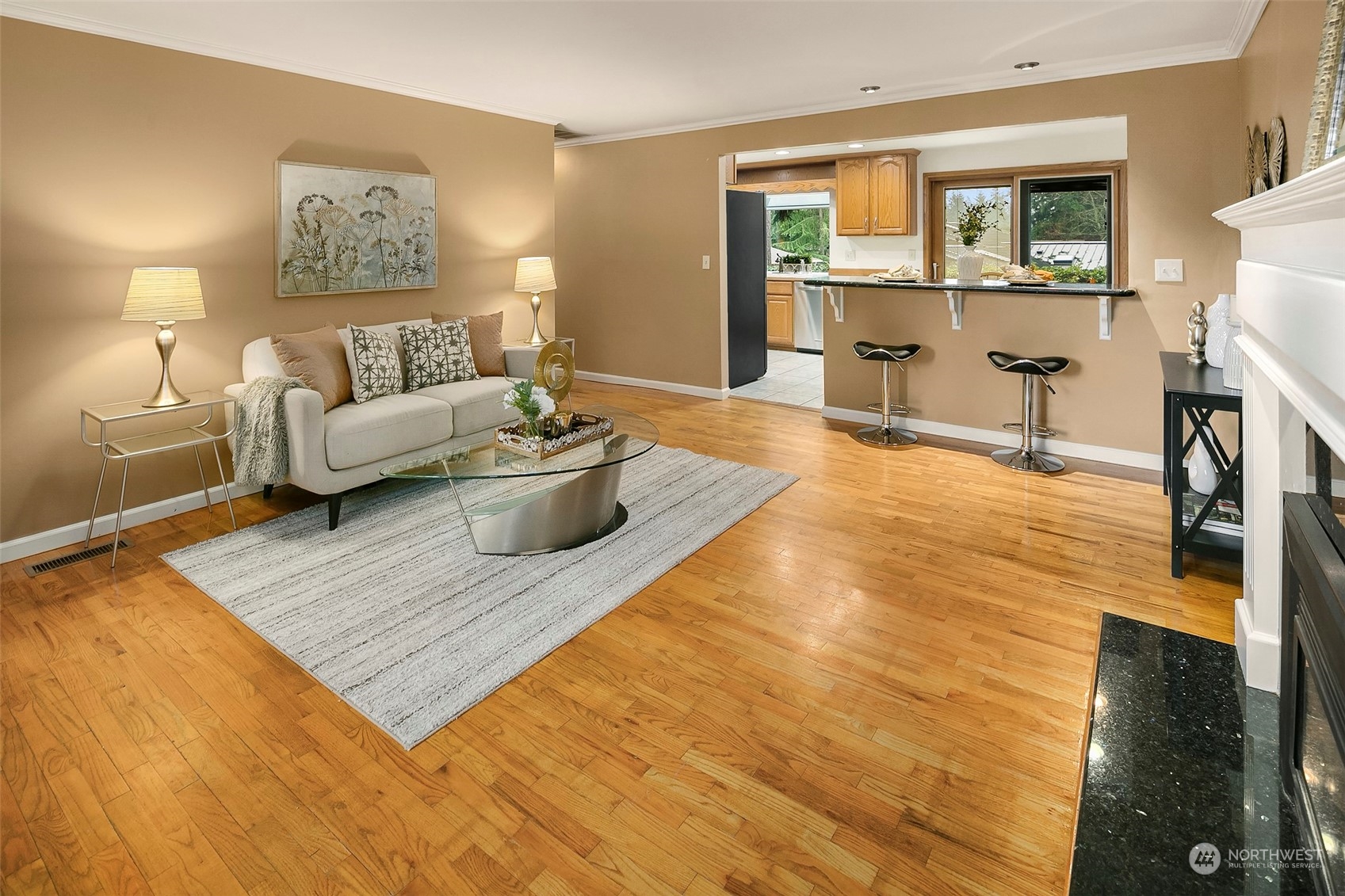 102 217th Place Southwest Bothell, WA 98021 - Photo 11 of 32 a living room with furniture and a flat screen tv