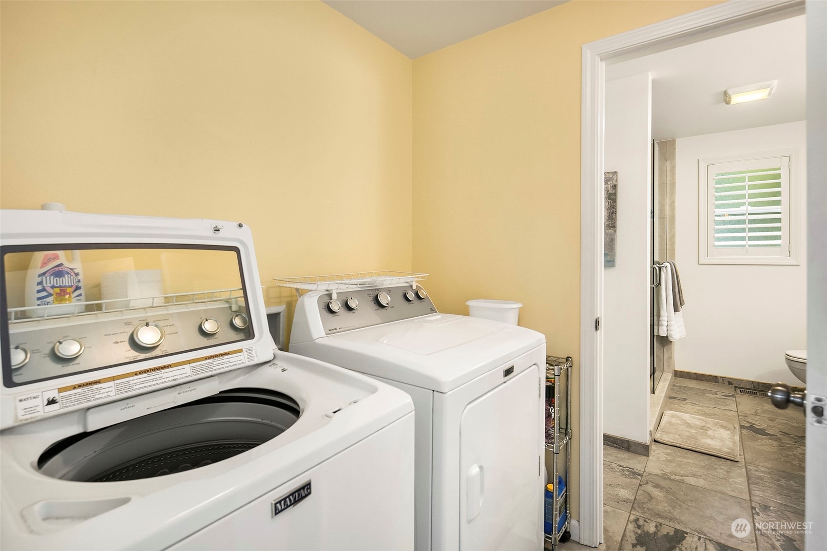 102 217th Place Southwest Bothell, WA 98021 - Photo 24 of 32 a utility room with dryer and washer