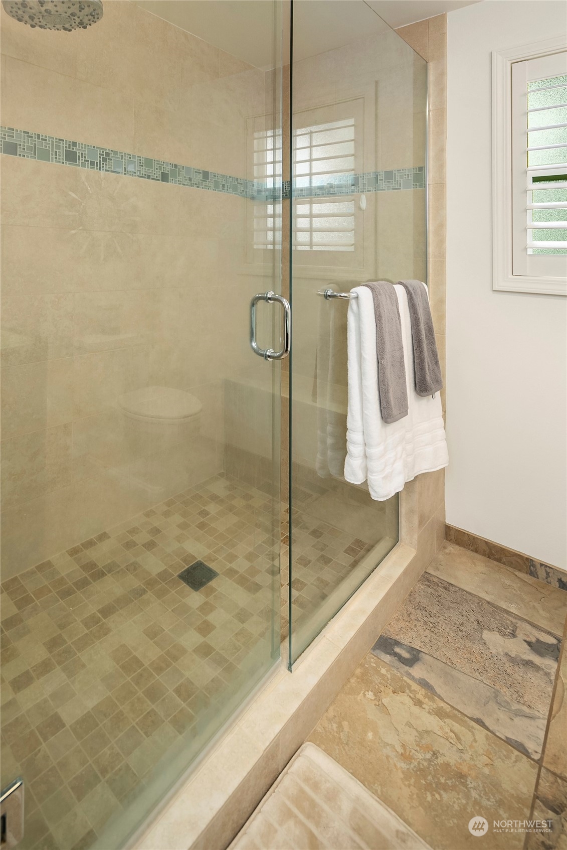 102 217th Place Southwest Bothell, WA 98021 - Photo 27 of 32 a bathroom with a shower