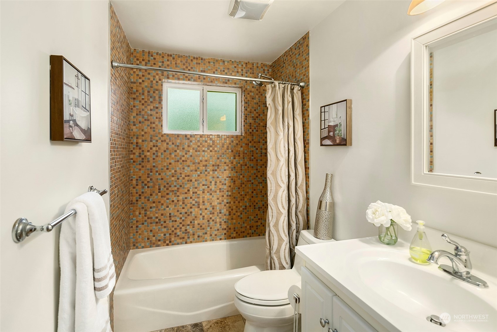 102 217th Place Southwest Bothell, WA 98021 - Photo 29 of 32 a bathroom with a sink toilet and shower