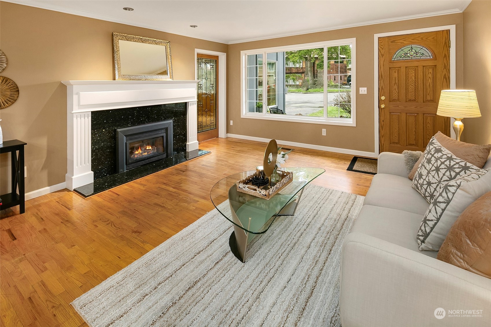 102 217th Place Southwest Bothell, WA 98021 - Photo 10 of 32 a living room with furniture and a fireplace
