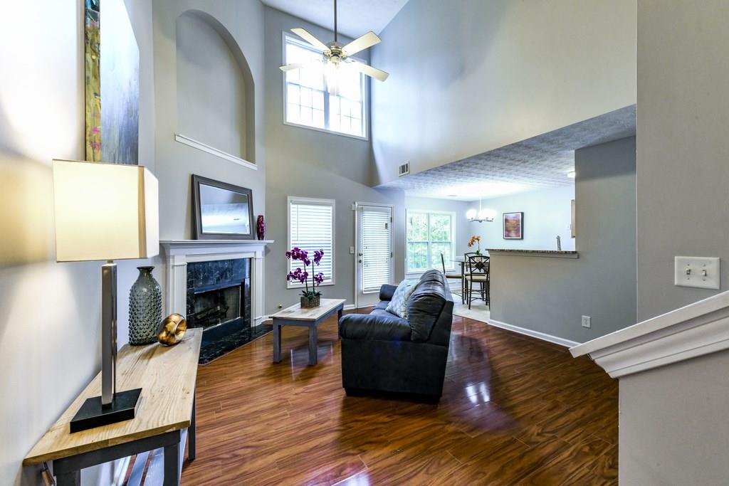 2026 Manhattan Parkway Decatur, GA 30035 - Photo 1 of 1 a living room with furniture and a fireplace