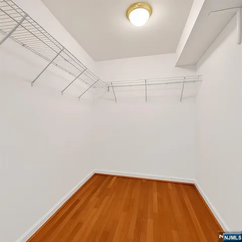 a view of a room with racks on the wall