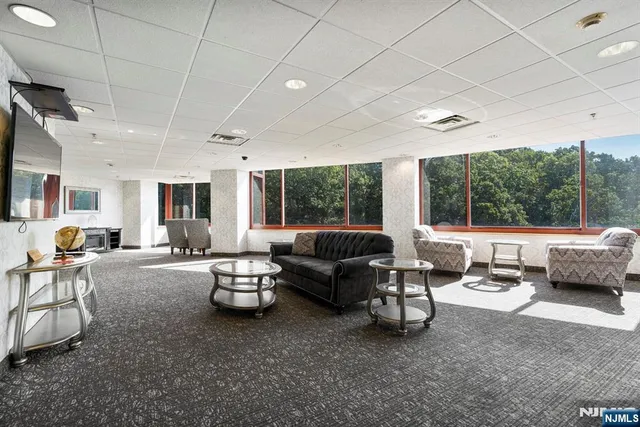 a view of parking garage with cars