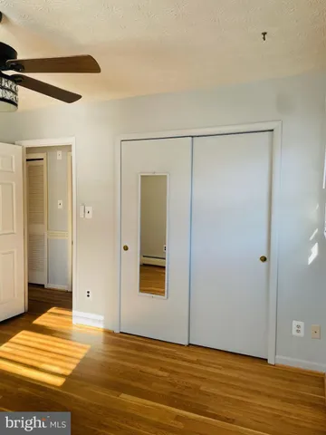 a view of a livingroom with furniture and staircase