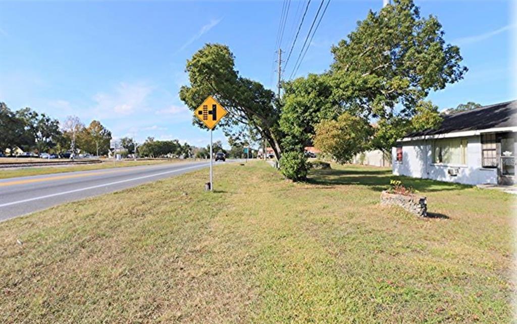 6117 Southeast Earp Road Belleview, FL 34420 - Photo 6 of 6 a view of a house with a yard