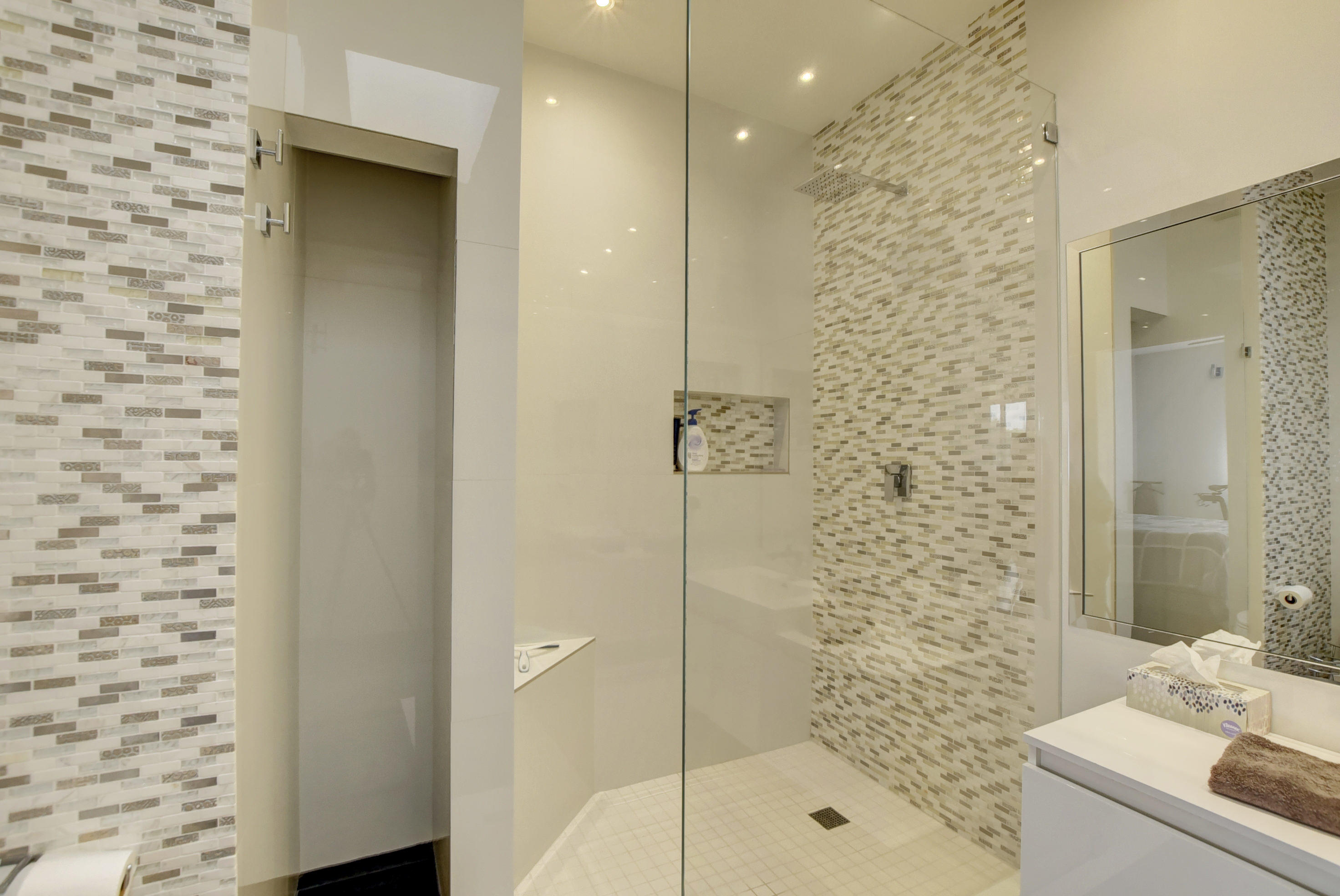 8682 Vía Reale, Unit 4 Boca Raton, FL 33496 - Photo 18 of 51 a bathroom with a shower and a sink