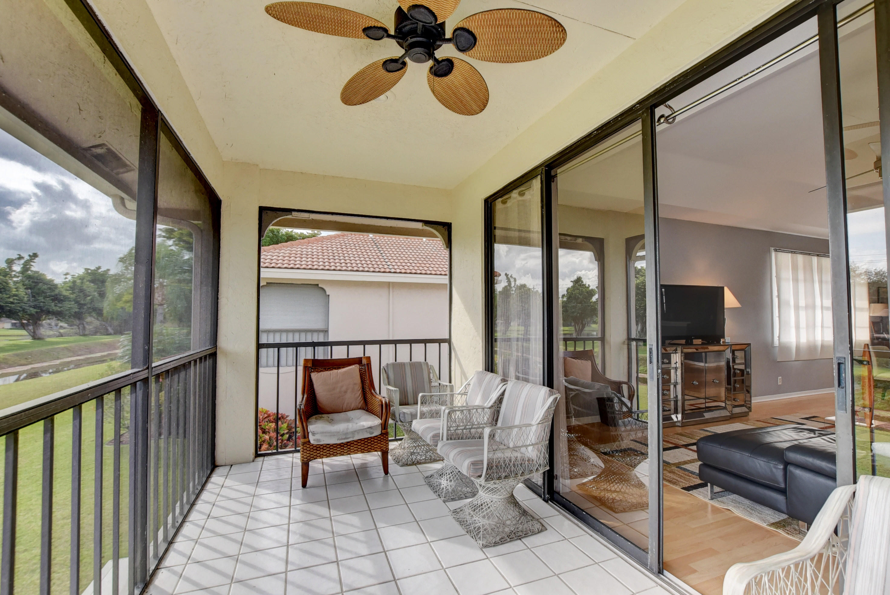 8682 Vía Reale, Unit 4 Boca Raton, FL 33496 - Photo 27 of 51 a living room with furniture