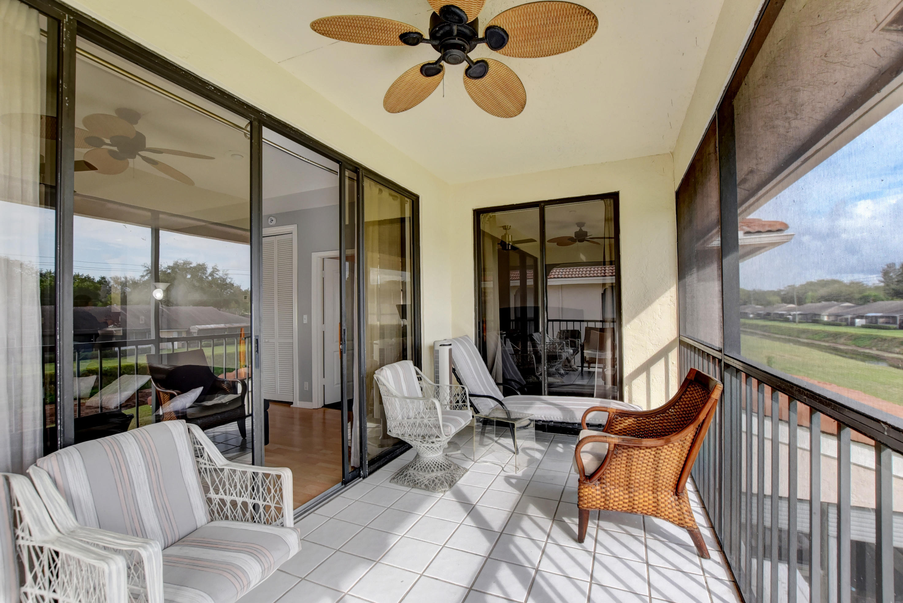 8682 Vía Reale, Unit 4 Boca Raton, FL 33496 - Photo 28 of 51 a view of a dining room with furniture window and outside view