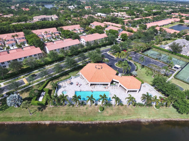 8682 Vía Reale, Unit 4 Boca Raton, FL 33496 - Photo 36 of 51 an aerial view of residential houses with outdoor space and river