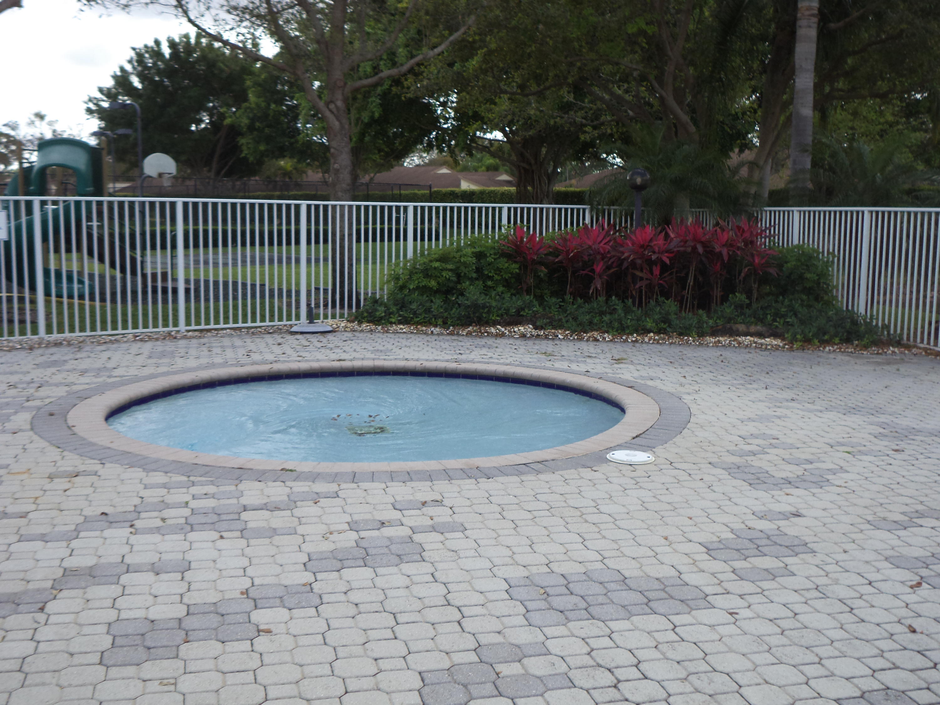 8682 Vía Reale, Unit 4 Boca Raton, FL 33496 - Photo 39 of 51 a view of a wrought fence