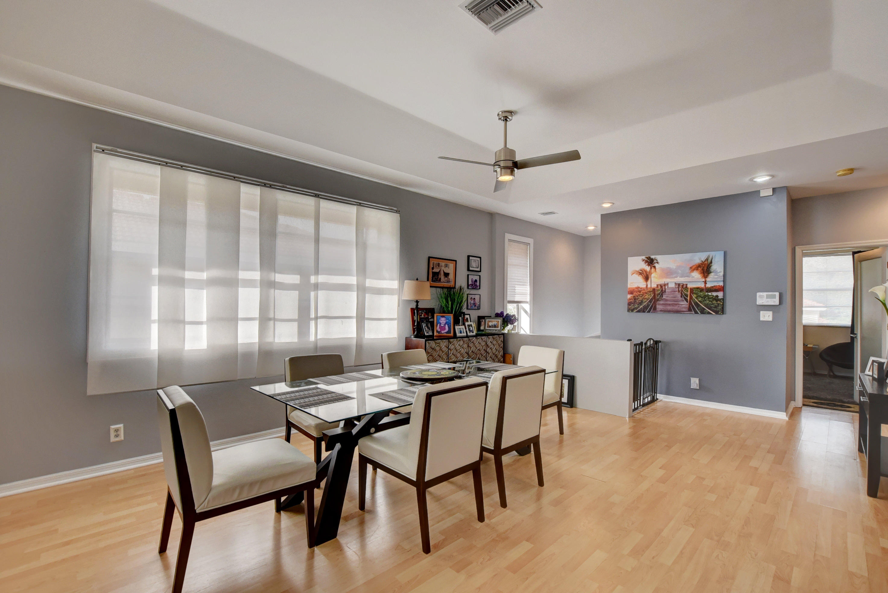 8682 Vía Reale, Unit 4 Boca Raton, FL 33496 - Photo 7 of 51 a view of a dining room with furniture window and outside view