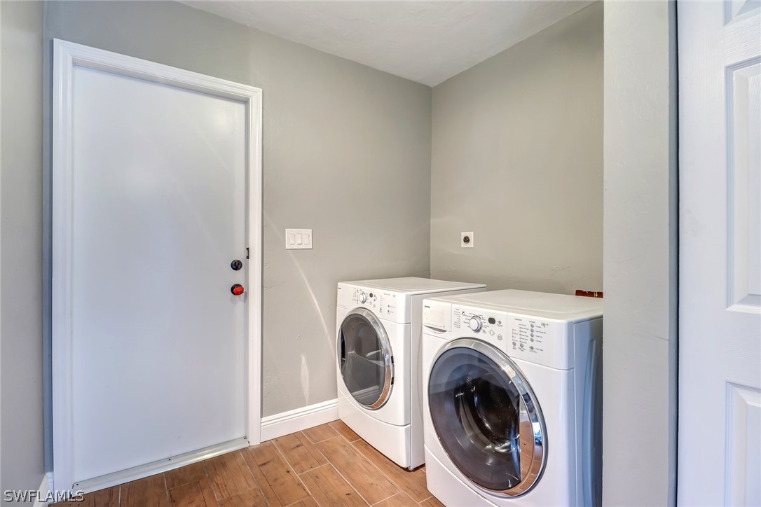5381 Jackson Road Fort Myers, FL 33905 - Photo 16 of 23 a utility room with dryer and washer
