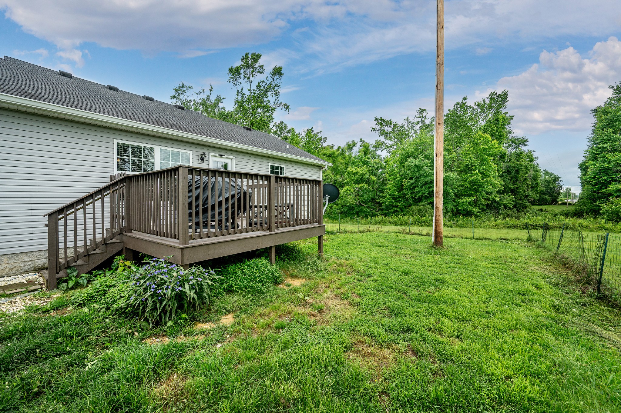 2995 Oak Grove Church Road Bethpage, TN 37022 - Photo 18 of 28 a view of a house with a yard