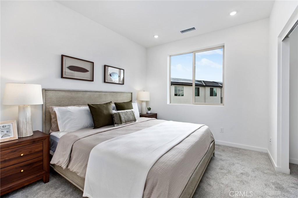 1553 Lima Way, Unit 2 Placentia, CA 92870 - Photo 15 of 48 a bedroom with a bed and a window