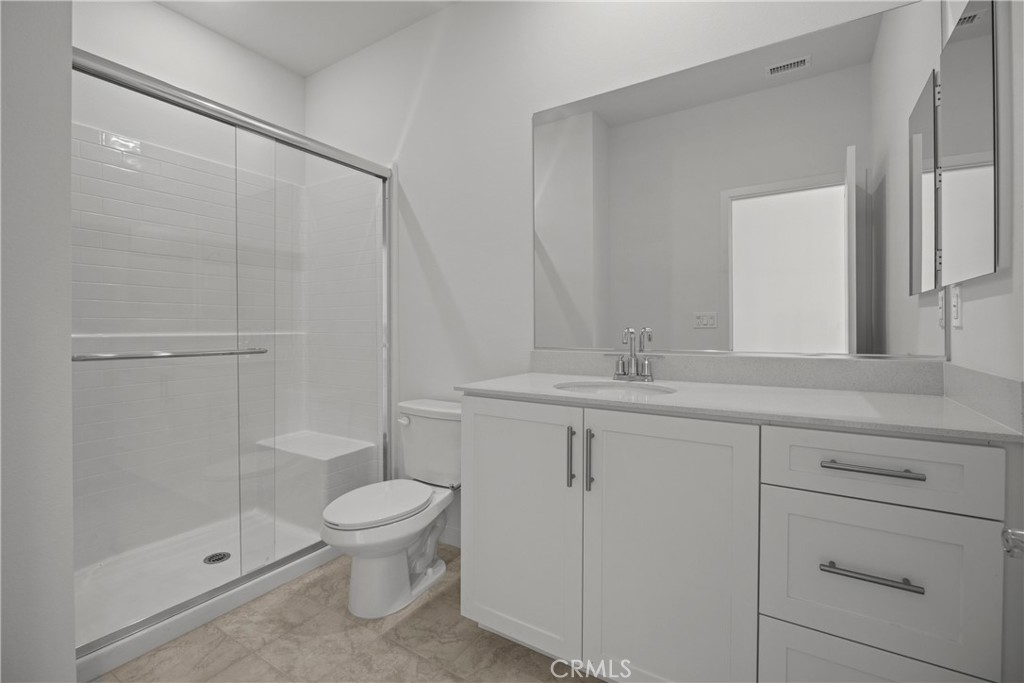 1553 Lima Way, Unit 2 Placentia, CA 92870 - Photo 17 of 48 a bathroom with a toilet sink and shower