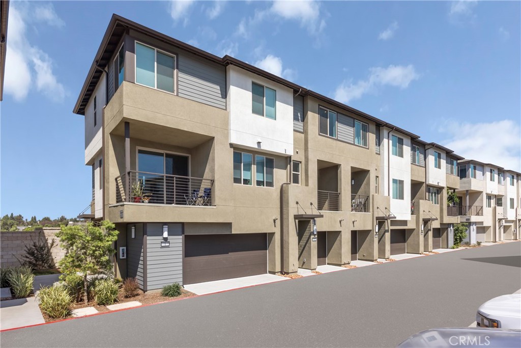 1553 Lima Way, Unit 2 Placentia, CA 92870 - Photo 3 of 48 a front view of a building with a street