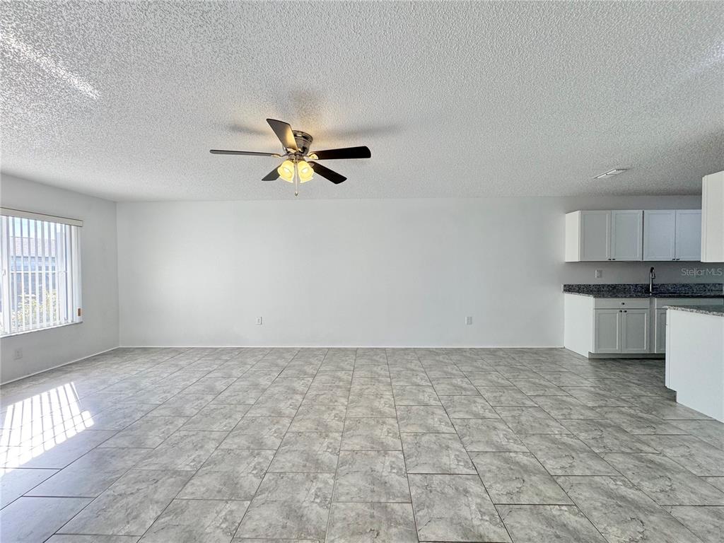 292 Winter Ridge Boulevard, Unit 292 Winter Haven, FL 33881 - Photo 10 of 37 a view of an empty room with a window