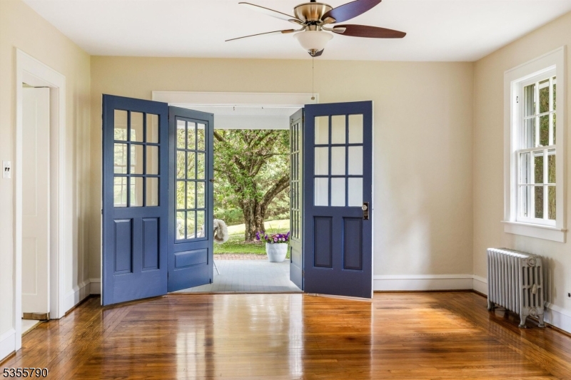 416 Rosemont Ringoes Road Stockton, NJ 08559 - Photo 14 of 39 a view of an entryway with wooden floor and a livingroom
