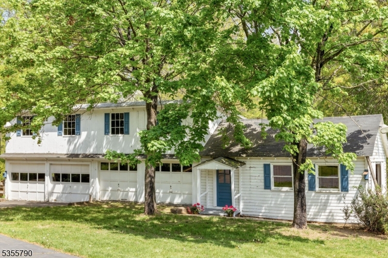 416 Rosemont Ringoes Road Stockton, NJ 08559 - Photo 31 of 39 a front view of a house with a yard and garage