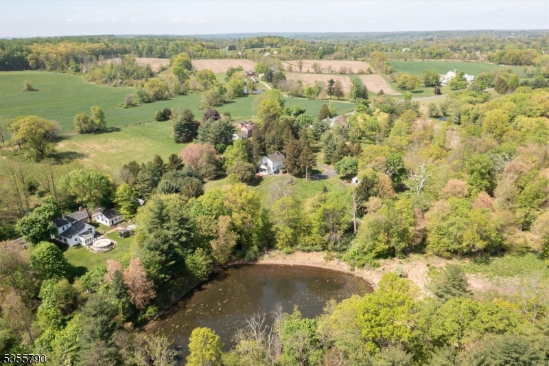 416 Rosemont Ringoes Road Stockton, NJ 08559 - Photo 37 of 39 a view of a lake with a city