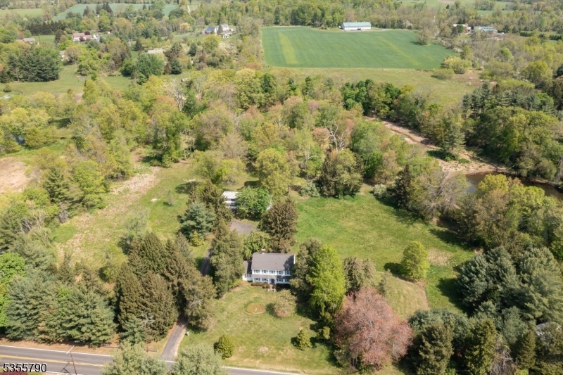 416 Rosemont Ringoes Road Stockton, NJ 08559 - Photo 39 of 39 a view of a yard with lake and green space