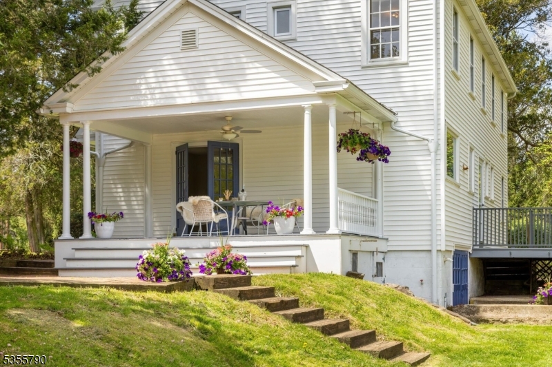 416 Rosemont Ringoes Road Stockton, NJ 08559 - Photo 5 of 39 a view of a house with backyard and sitting area