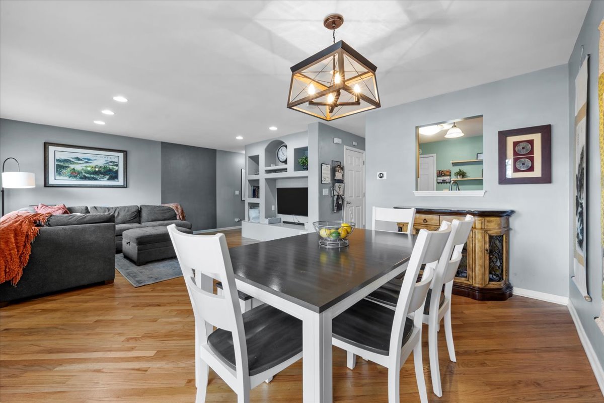 907 Main Street Batavia, IL 60510 - Photo 7 of 20 a view of a dining room with furniture and wooden floor