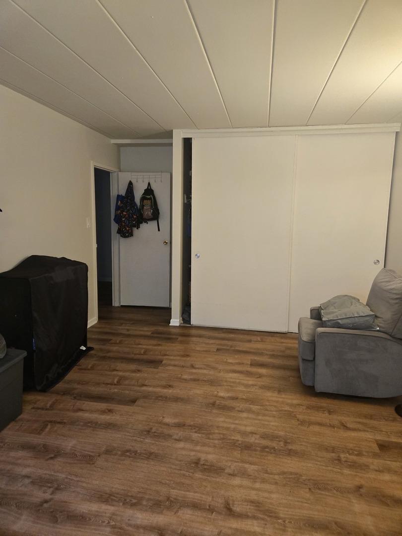 1141 Leavitt Avenue, Unit 115 Flossmoor, IL 60422 - Photo 13 of 18 a view of room with a flat screen tv