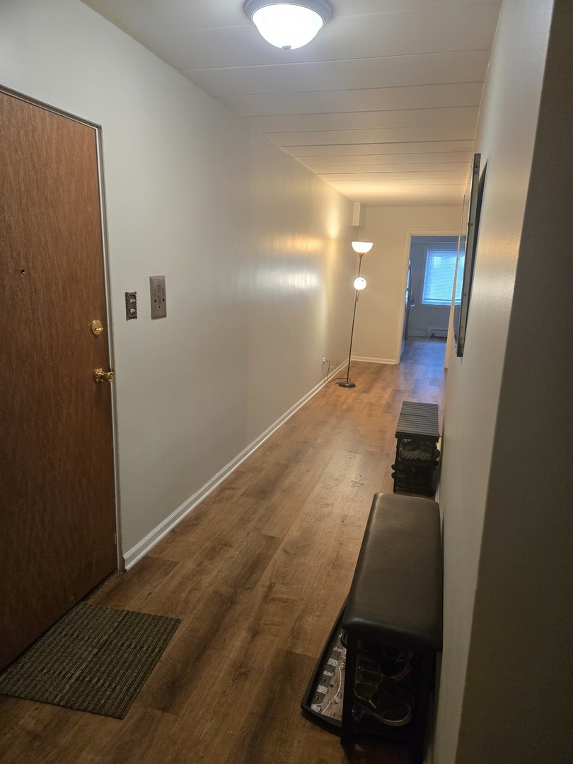 1141 Leavitt Avenue, Unit 115 Flossmoor, IL 60422 - Photo 2 of 18 wooden floor in a gallery