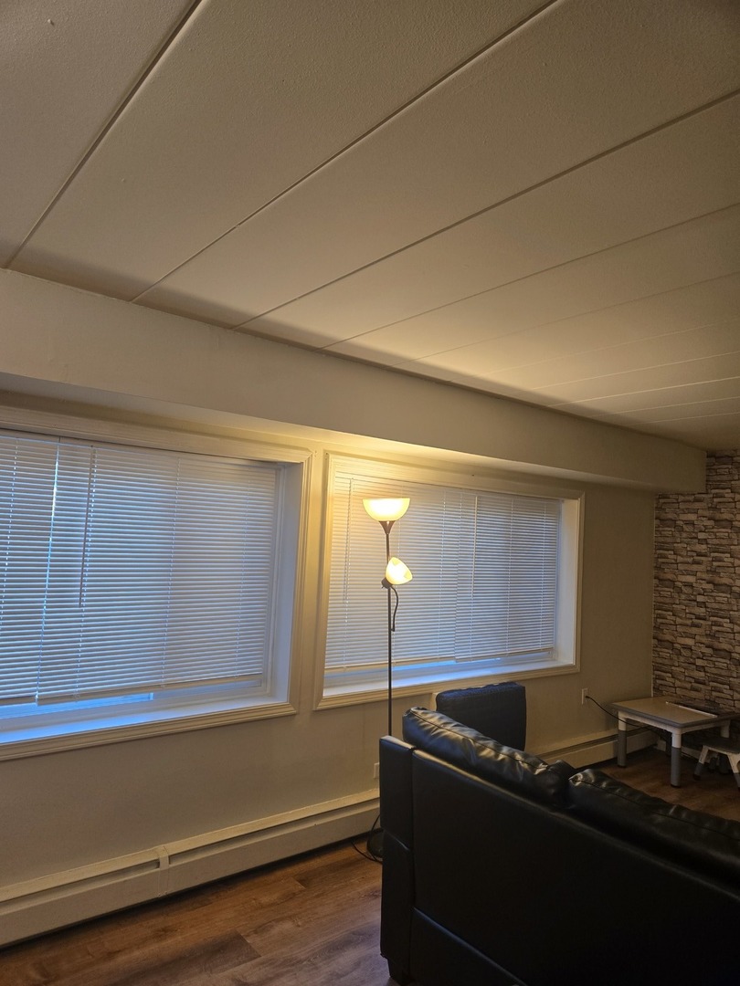 1141 Leavitt Avenue, Unit 115 Flossmoor, IL 60422 - Photo 5 of 18 a car parked in front of a house