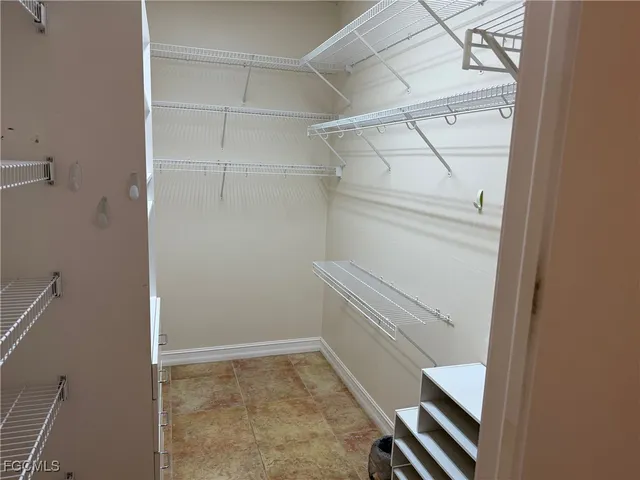 a view of an empty walk in closet