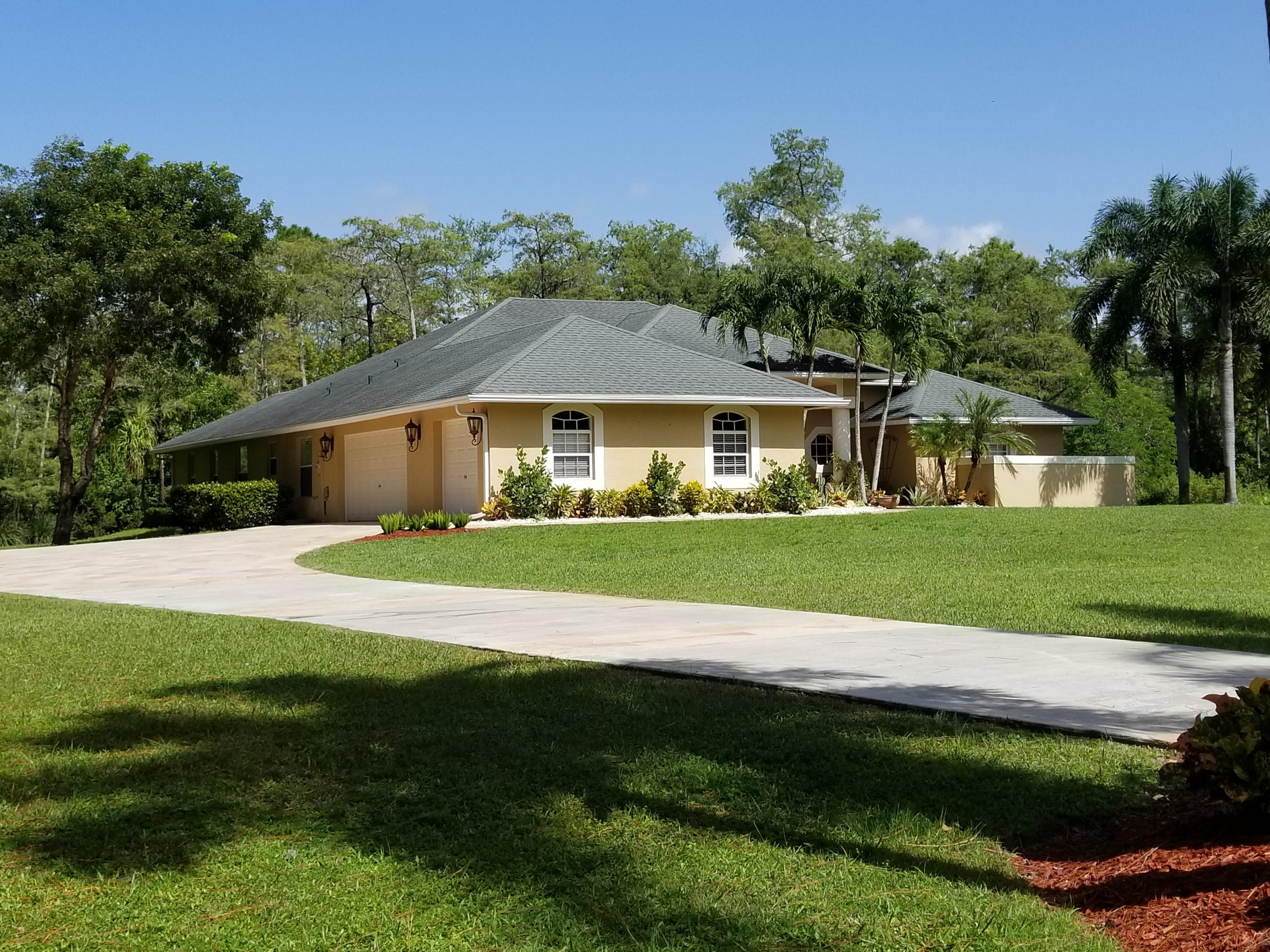 6037 Reynolds Road Lake Worth, FL 33449 - Photo 2 of 44 CONCRETE DRIVWAY