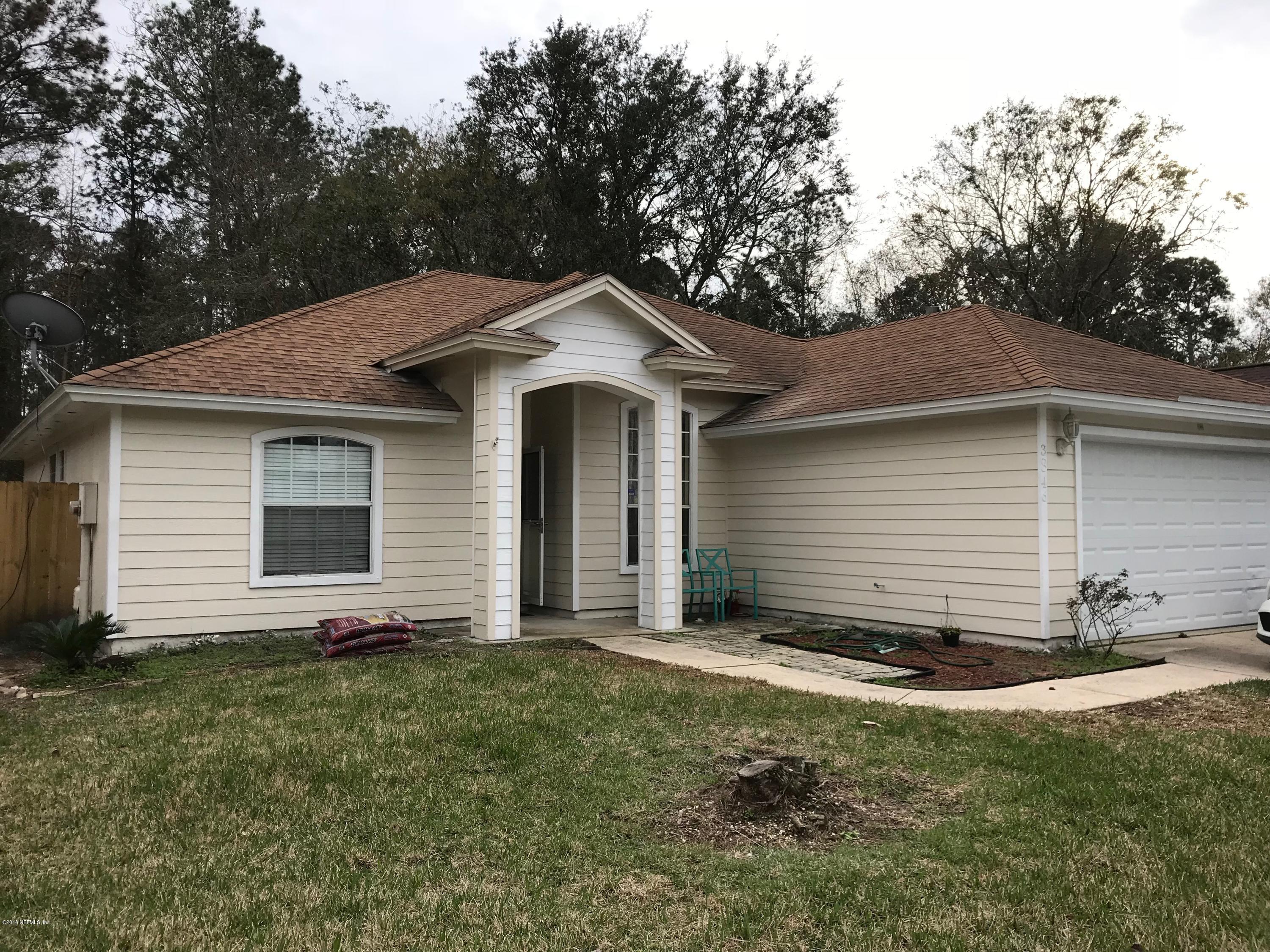 3846 Chapelgate Road Jacksonville, FL 32223 - Photo 1 of 11 Front
