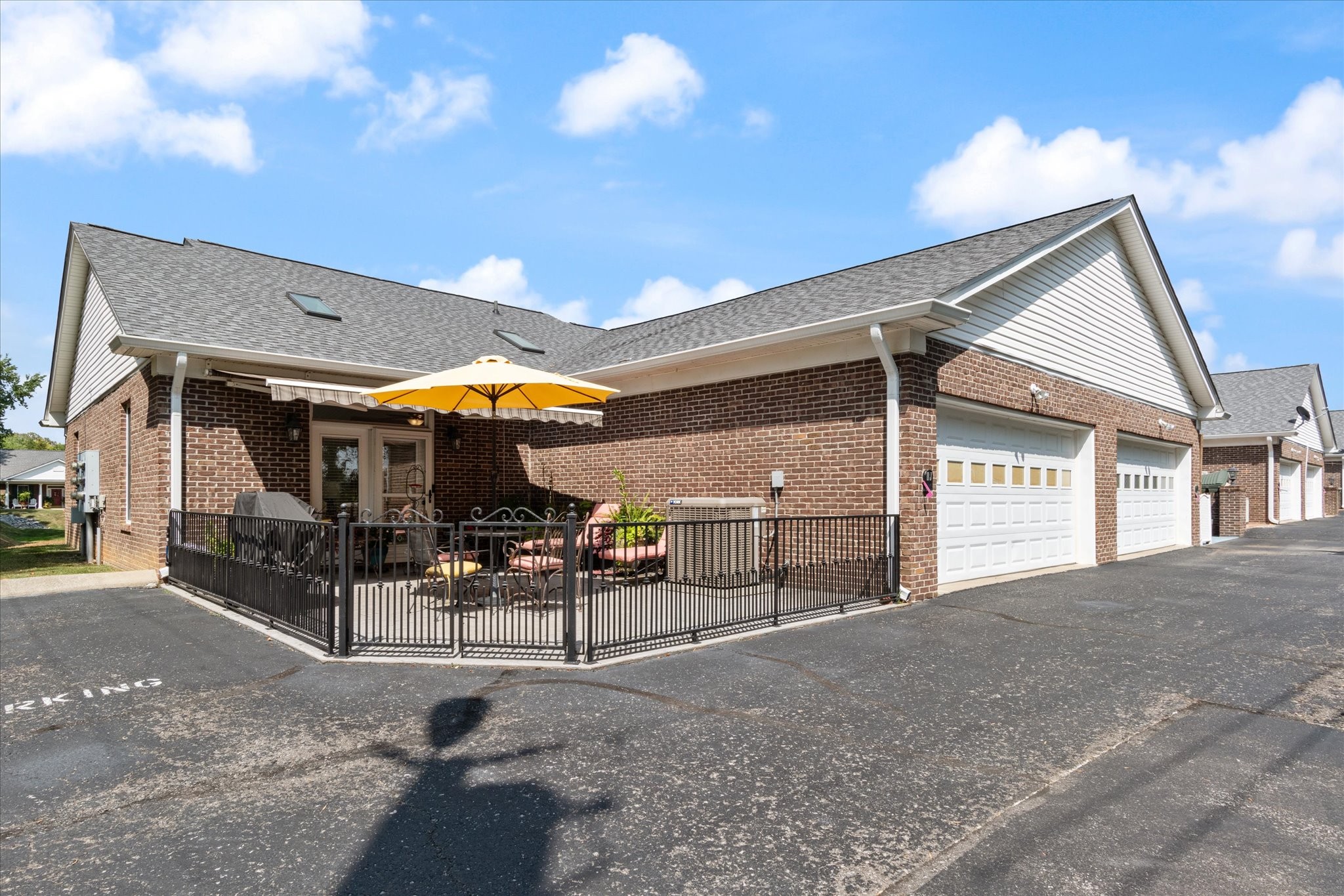 705 Blackpatch Drive, Unit 11 Springfield, TN 37172 - Photo 22 of 25 Spacious stamped concrete patio with remote awning.