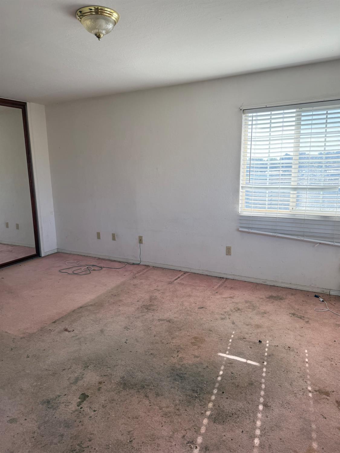 301 B Street Isleton, CA 95641 - Photo 18 of 30 an empty room with a window