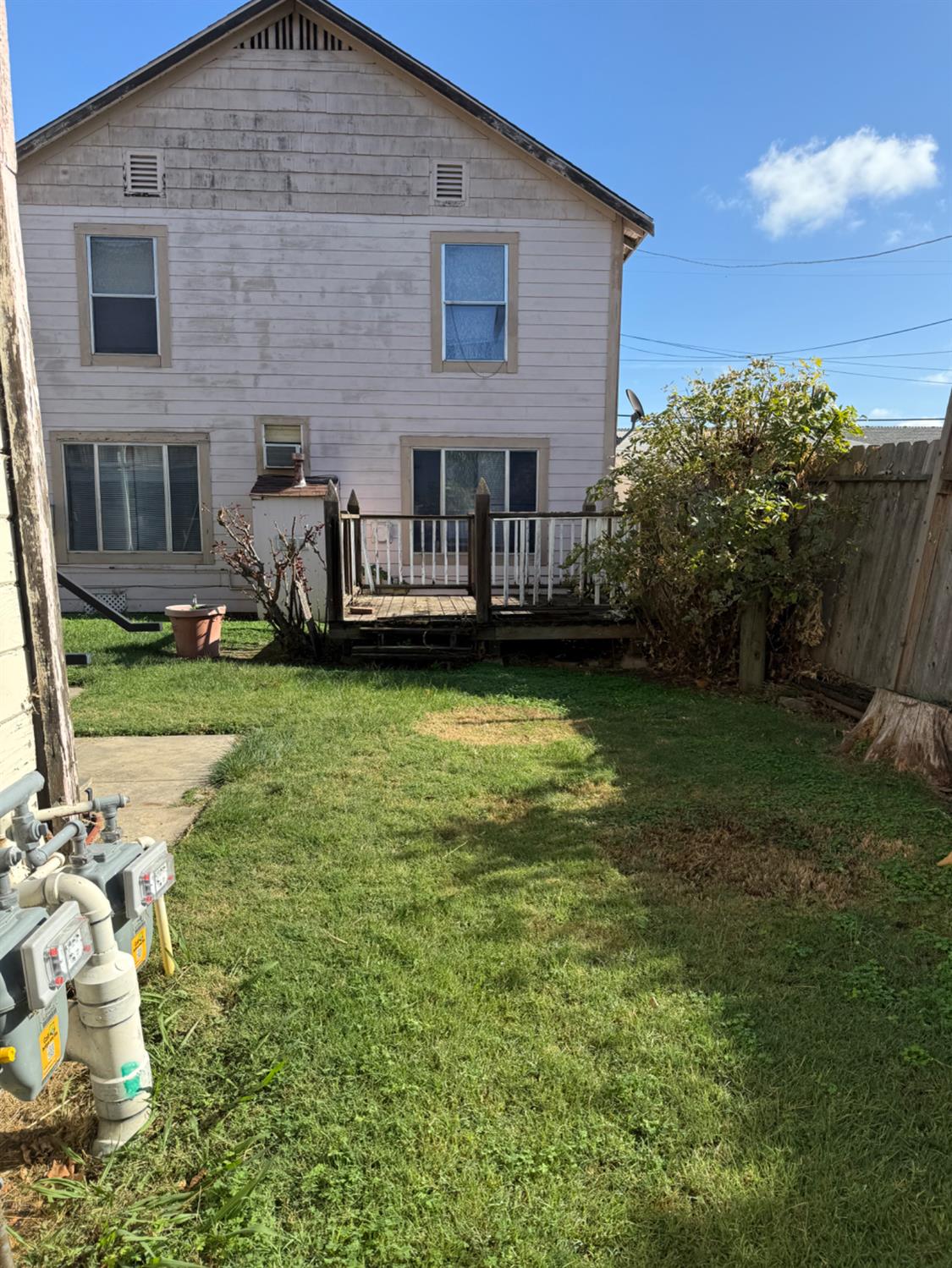 301 B Street Isleton, CA 95641 - Photo 25 of 30 a view of a house with a yard and sitting area