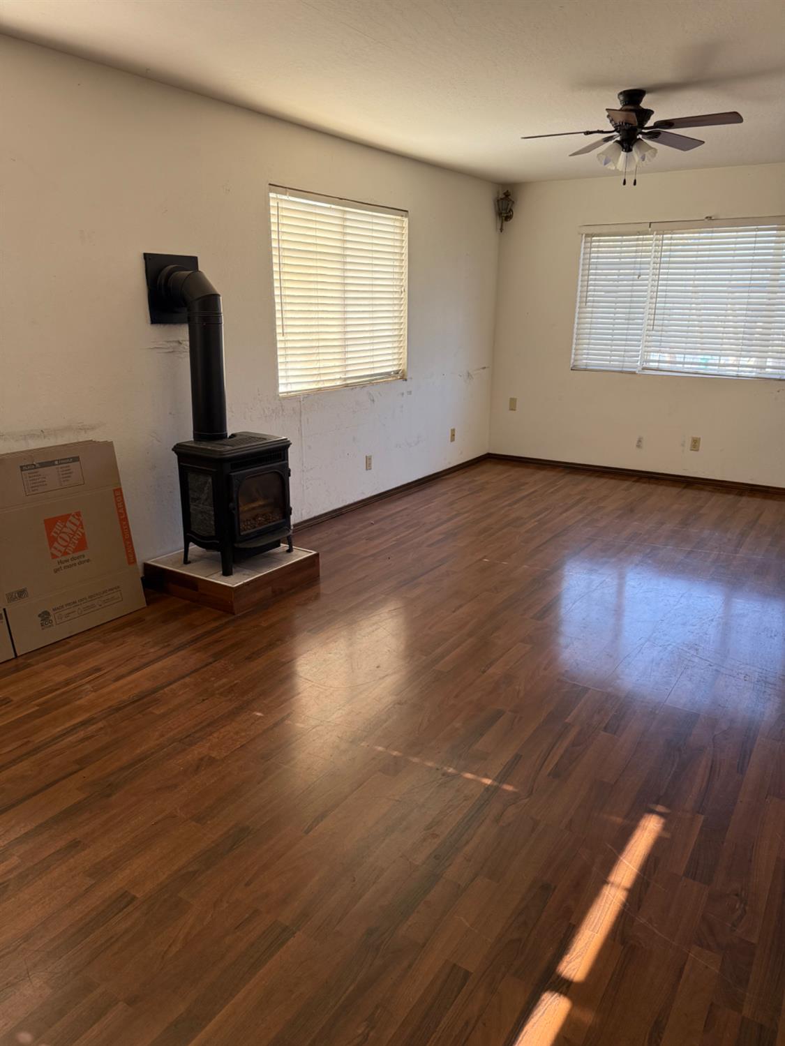 301 B Street Isleton, CA 95641 - Photo 8 of 30 a view of a livingroom with wooden floor and a window