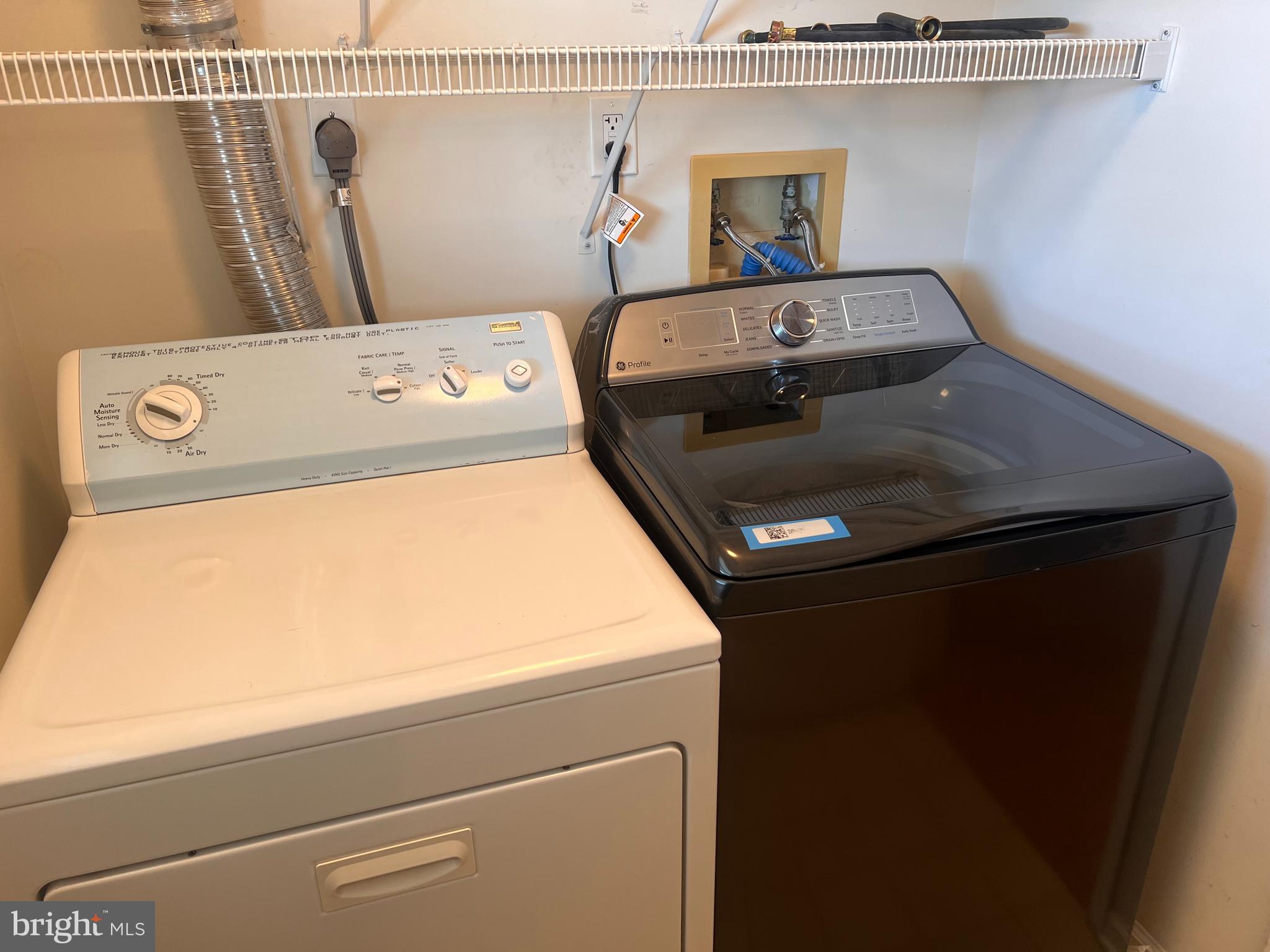 6073 Main Street Voorhees, NJ 08043 - Photo 14 of 16 a utility room with dryer and washer