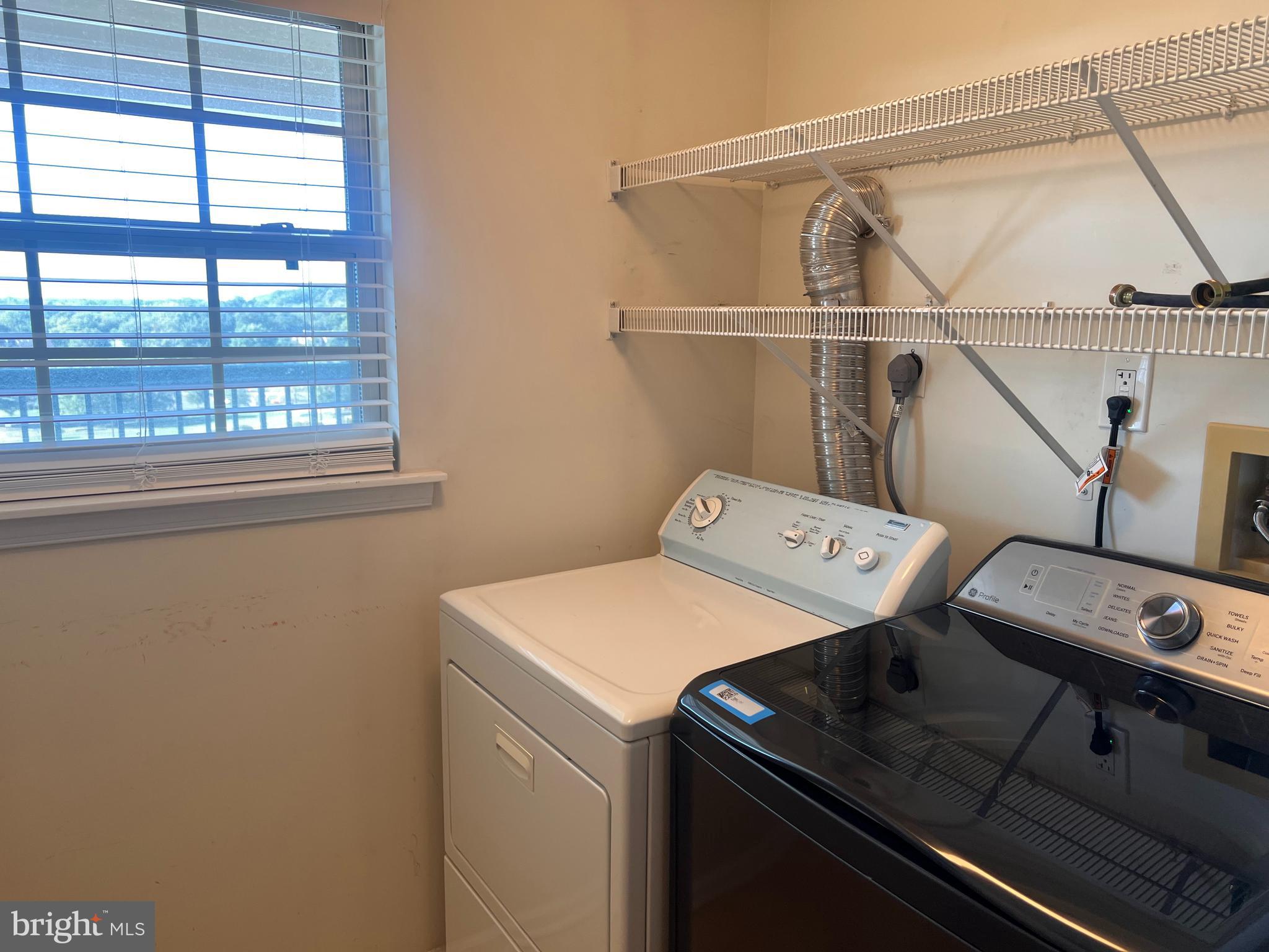 6073 Main Street Voorhees, NJ 08043 - Photo 15 of 16 a utility room with dryer and washer