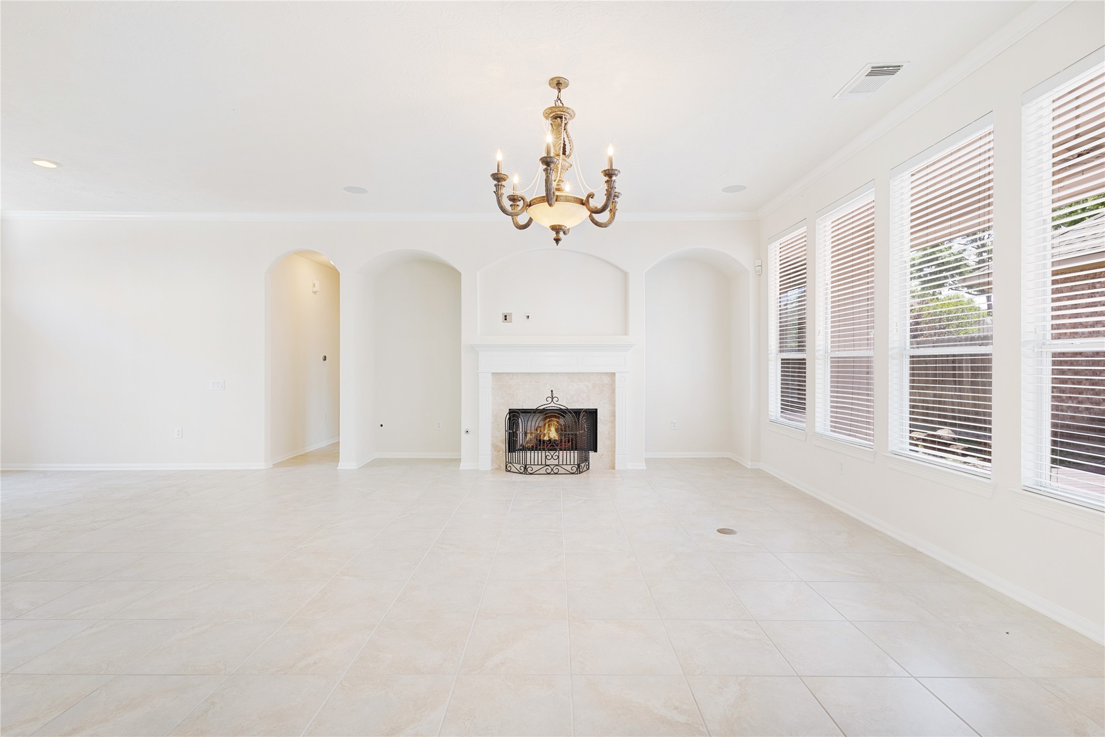 43 Tarrytown Way Conroe, TX 77384 - Photo 15 of 41 a view of an empty room with a fireplace