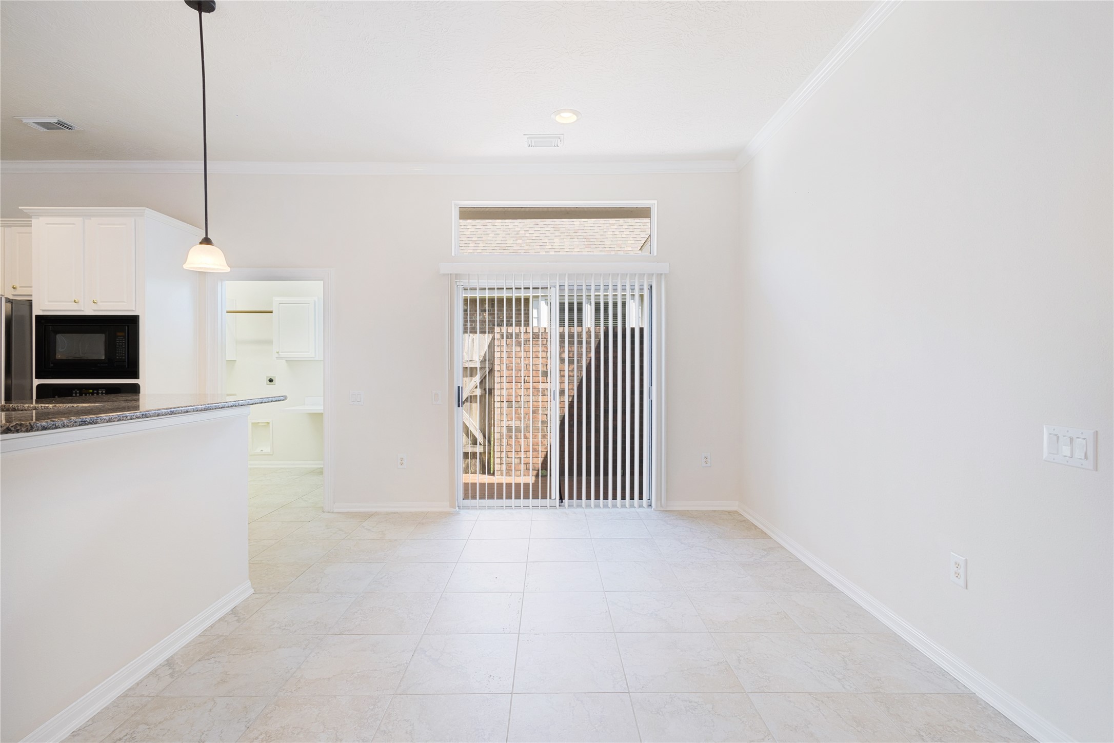 43 Tarrytown Way Conroe, TX 77384 - Photo 17 of 41 a view of an empty room with a fireplace