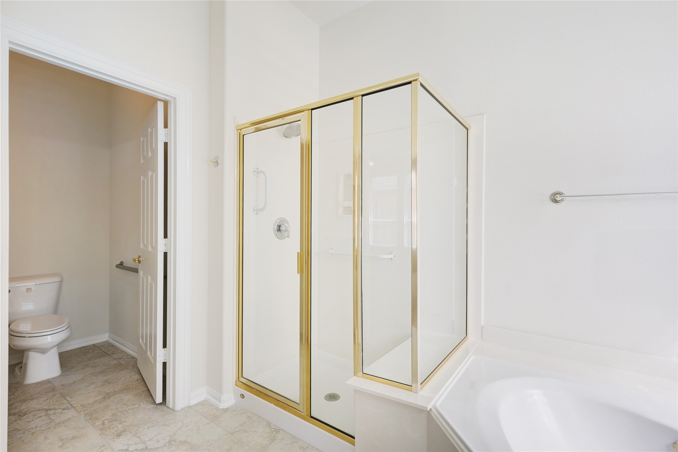 43 Tarrytown Way Conroe, TX 77384 - Photo 26 of 41 a bathroom with a shower and a toilet