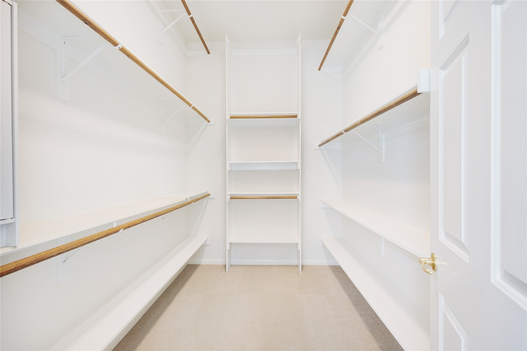 43 Tarrytown Way Conroe, TX 77384 - Photo 27 of 41 a view of an empty walk in closet