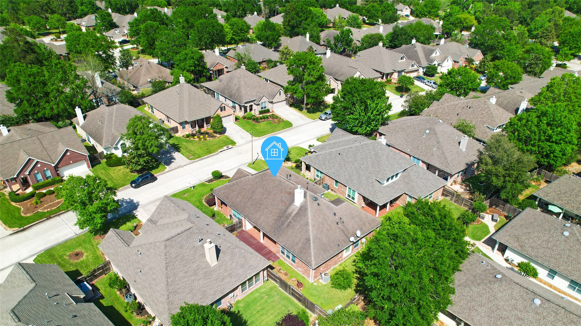 43 Tarrytown Way Conroe, TX 77384 - Photo 39 of 41 an aerial view of residential houses with outdoor space and street view